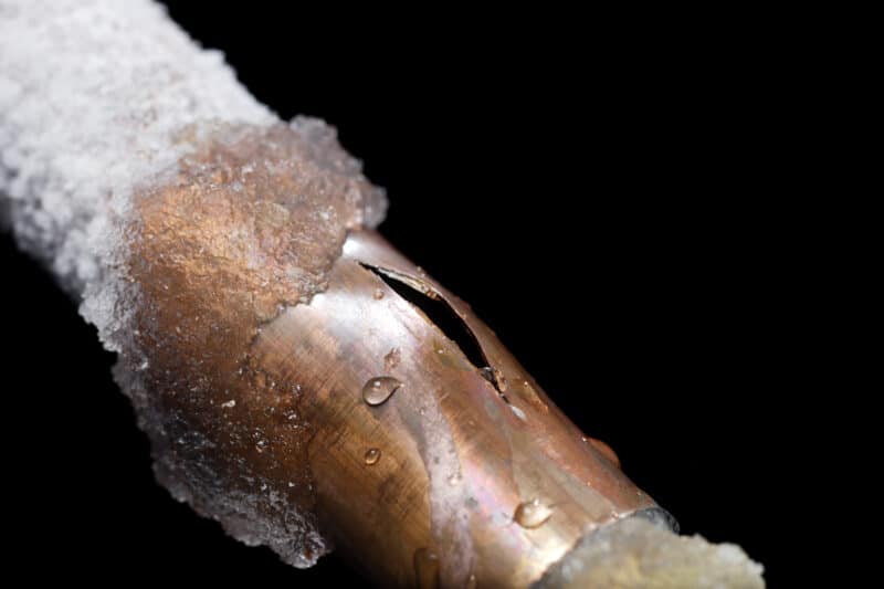 leaking pipe needing plumbing repairs in winter