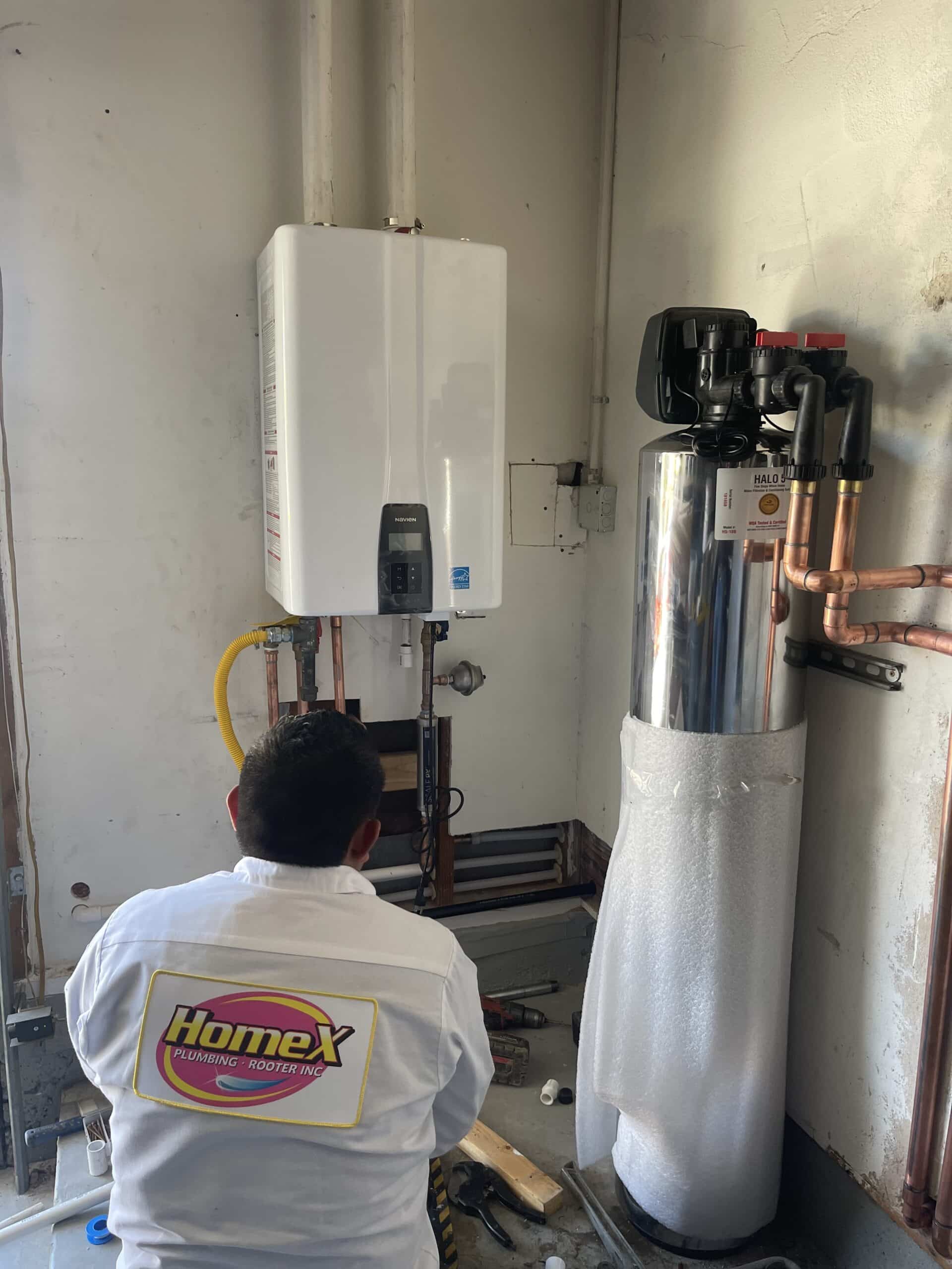 HomeX plumber installing water heater expansion tank