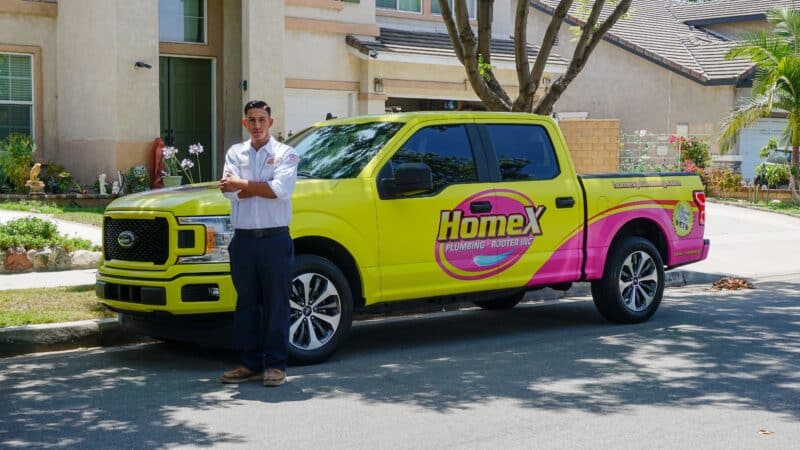 HomeX team member with company truck