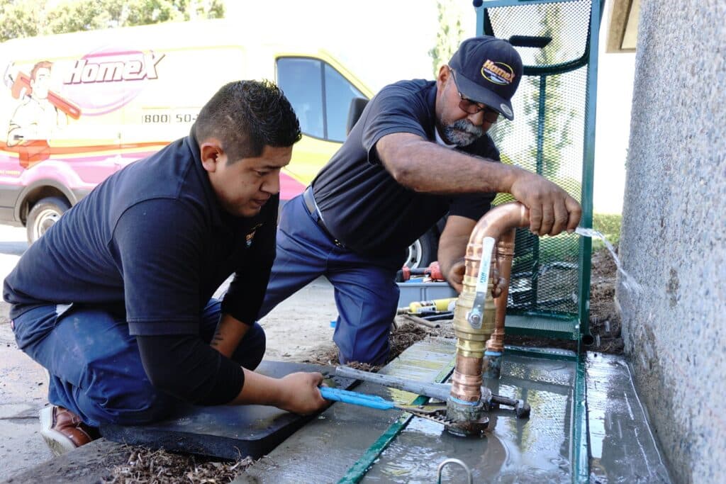 HomeX plumbers providing plumbing repair services for leaky pipe