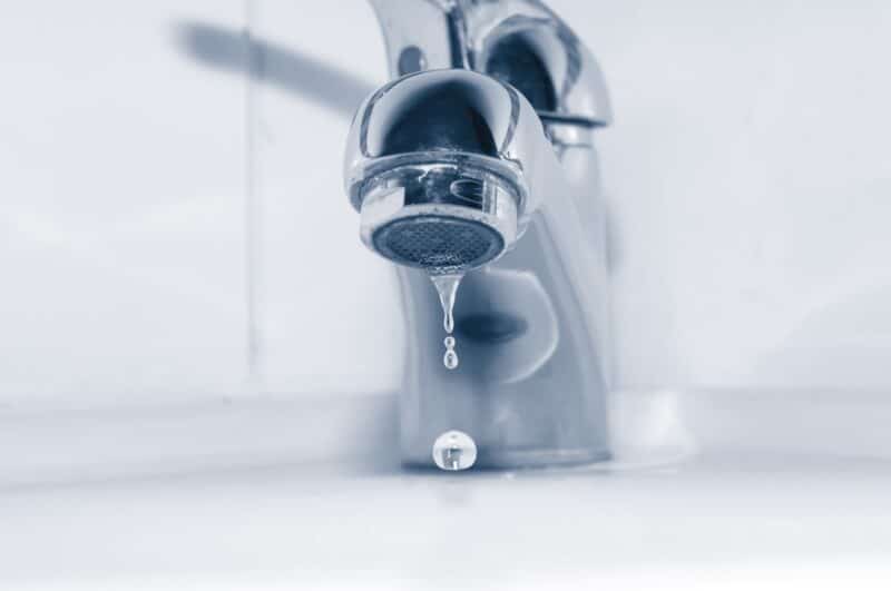 sink dripping water in need of plumbing repair